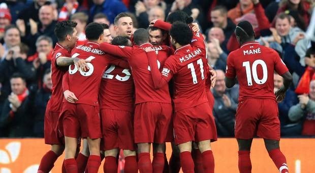 Liverpool players in a huddle